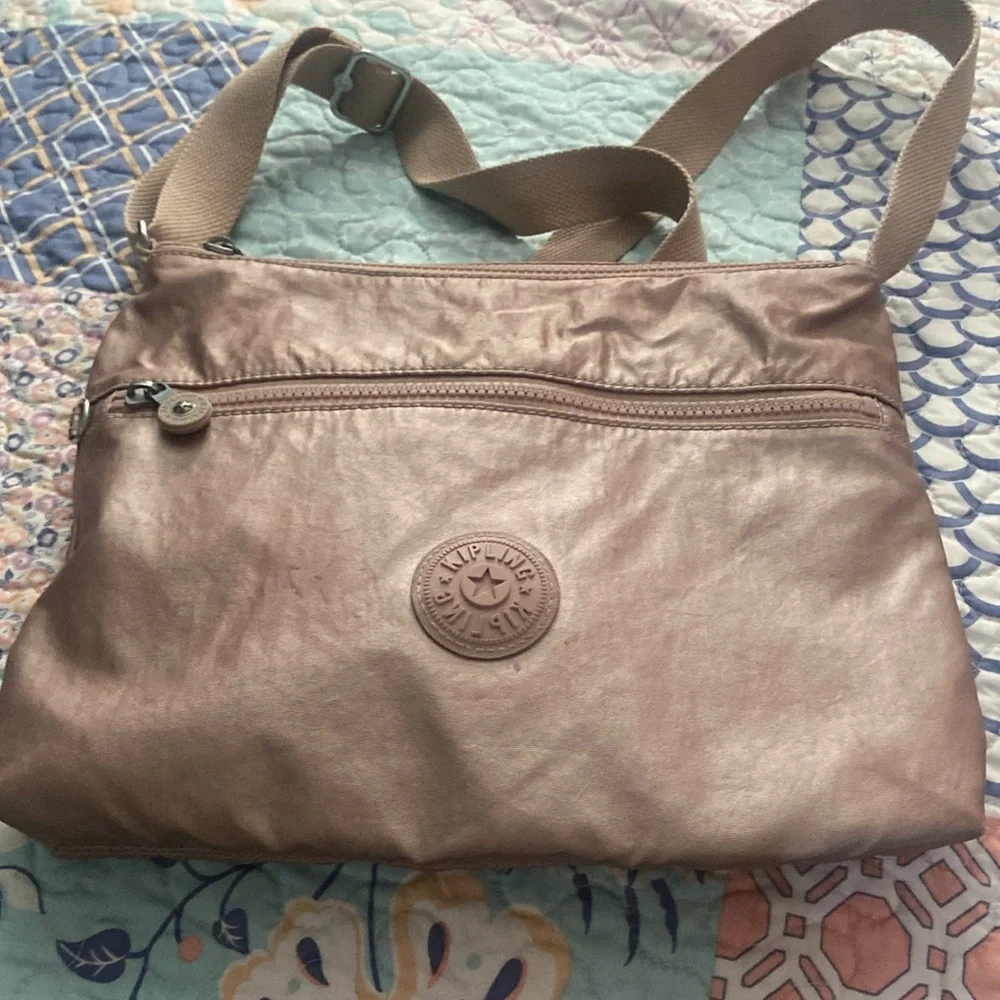 Rose Gold Kipling Pink Crossbody Bag with Signature Style